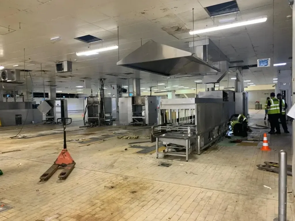 Industrial kitchen dismantling in progress, showcasing equipment removal and site clearance by London Metal &amp; Recycling Ltd for ⁠Commercial Kitchen, Chiller &amp; Ac Unit Recycling in Willesden.