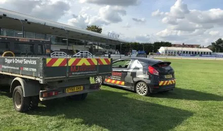 Two vehicles branded with MJ Digger &amp; Driver Hire Services parked on grass, showcasing MJ Digger &amp; Driver Hire Services's Digger &amp; Driver Hire offerings.