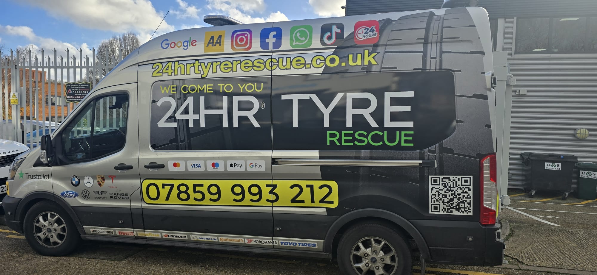 Mobile tyre fitting van with "24HR TYRE RESCUE" branding and contact number, representing {{company_name}} in {{place}}.
