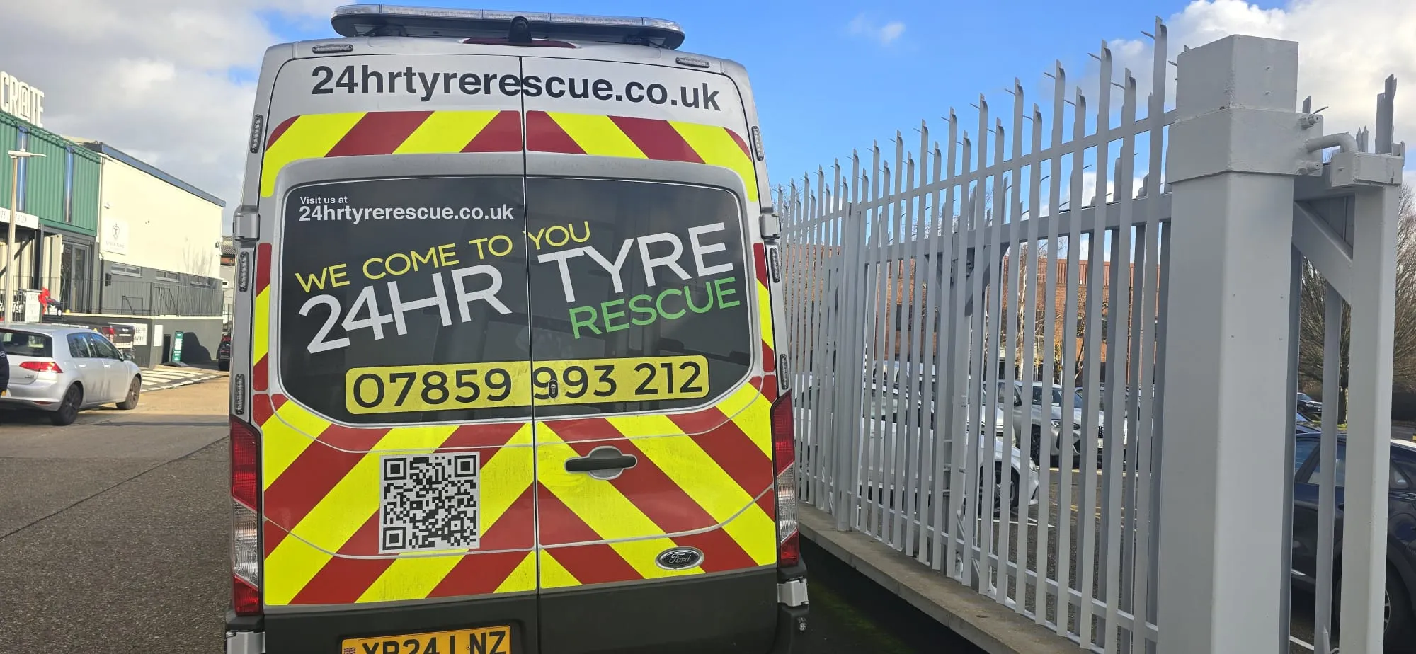Rear view of a mobile tyre fitting van with "24HR TYRE RESCUE" signage, promoting Emergency Tyres Harlow's services in Mark Hall South.